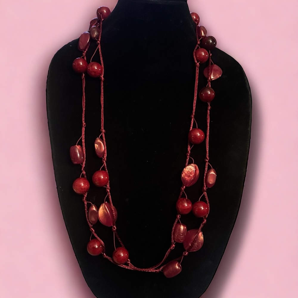 Isis long polished bead station cord necklace
